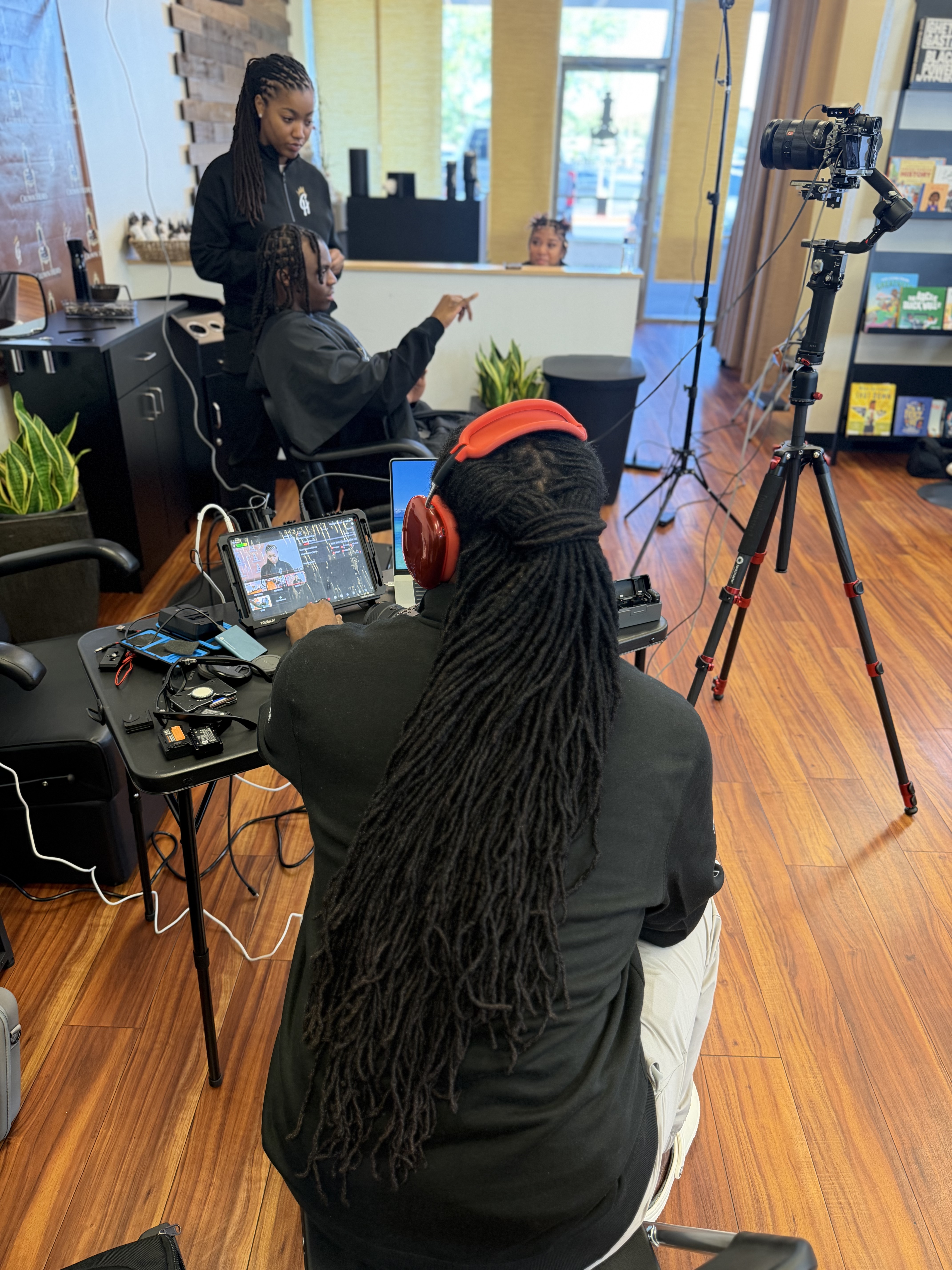 Bethany being filmed in a podcast recording setup